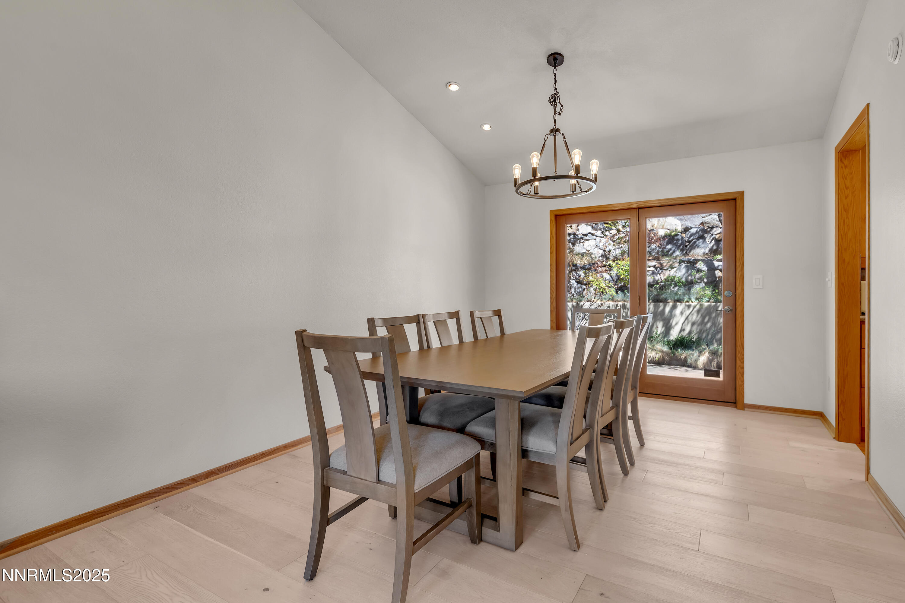 2593 Chaparral Court Reno, NV 89509 - Photo 32 of 37 a view of a dining room with furniture window and wooden floor