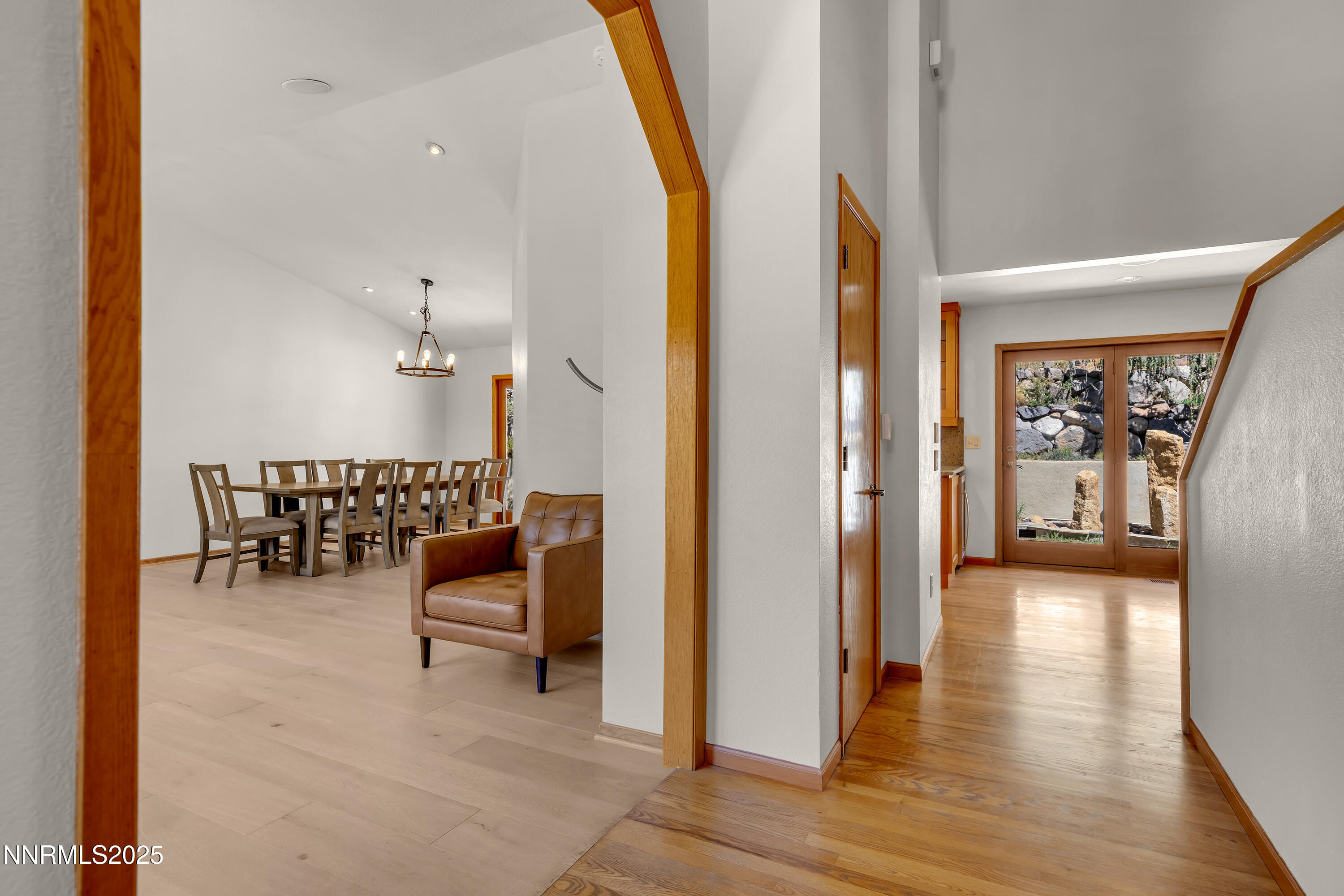 2593 Chaparral Court Reno, NV 89509 - Photo 36 of 37 a view of a hallway with wooden floor and furniture