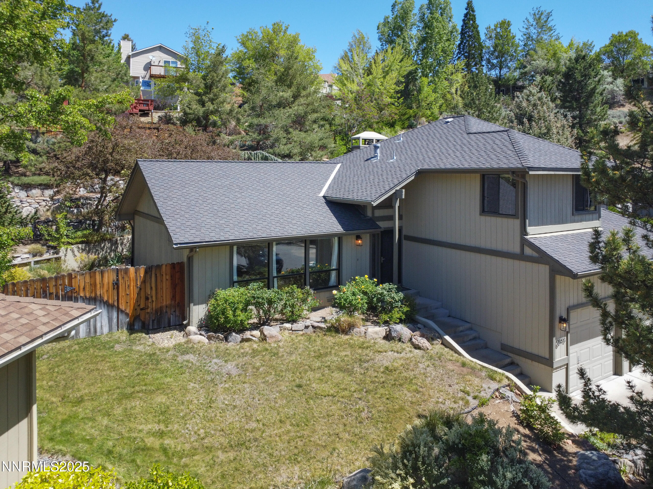 2593 Chaparral Court Reno, NV 89509 - Photo 4 of 37 front view of a house with a yard