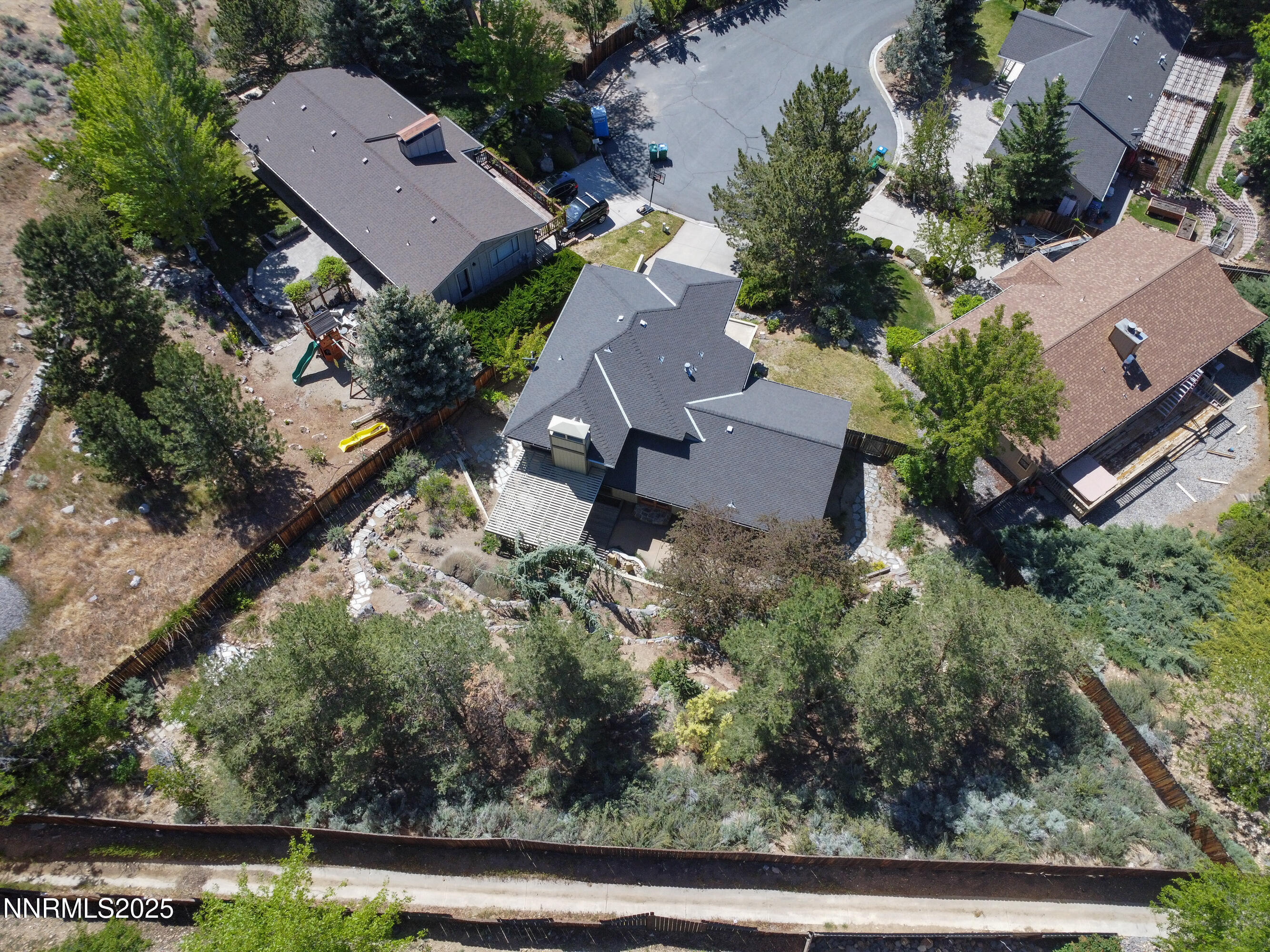 2593 Chaparral Court Reno, NV 89509 - Photo 6 of 37 an aerial view of a house with garden space and street view