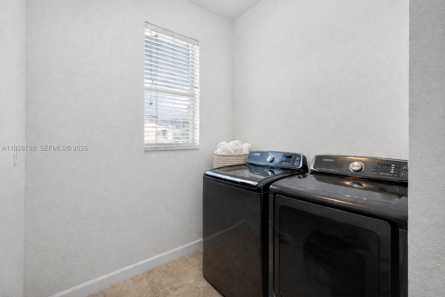 9443 Southwest 170th Path Miami, FL 33196 - Photo 33 of 43 Upstairs Laundry Room