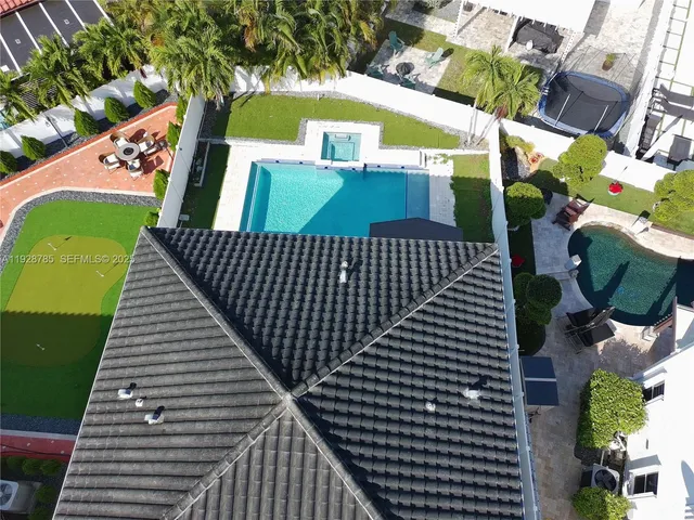 a view of a dining room with furniture and window