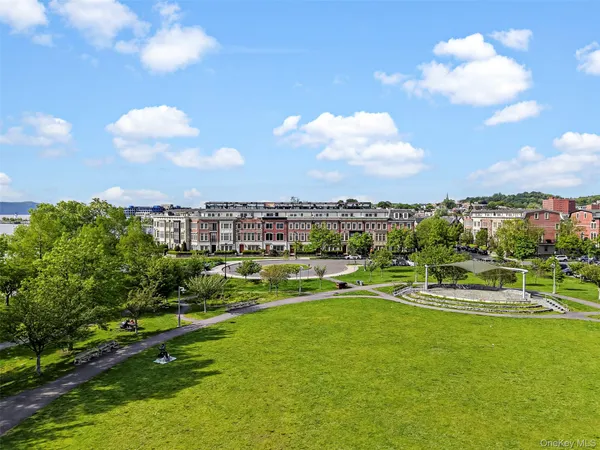 a view of a golf course with a lake view