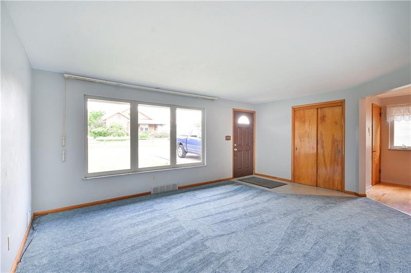 459 Marzolf Road Pittsburgh, PA 15209 - Photo 2 of 25 The living room gets plenty of sunlight. Large coat closet, tile entry and the carpet is in great shape! If carpet isn't your thing, there is hardwood underneath.