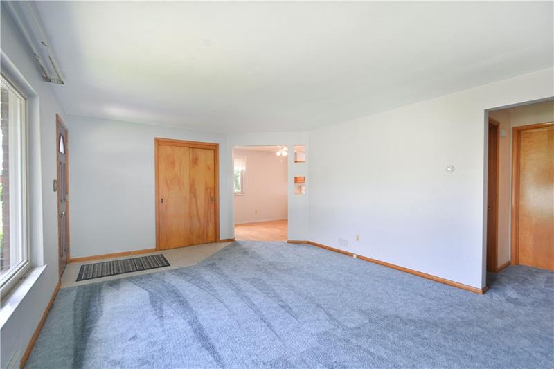 459 Marzolf Road Pittsburgh, PA 15209 - Photo 3 of 25 The doorway to the right leads to the bedrooms and bathroom. The entry straight ahead takes you to the eat-in kitchen and basement door.