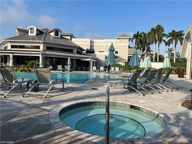 a view of a patio with swimming pool