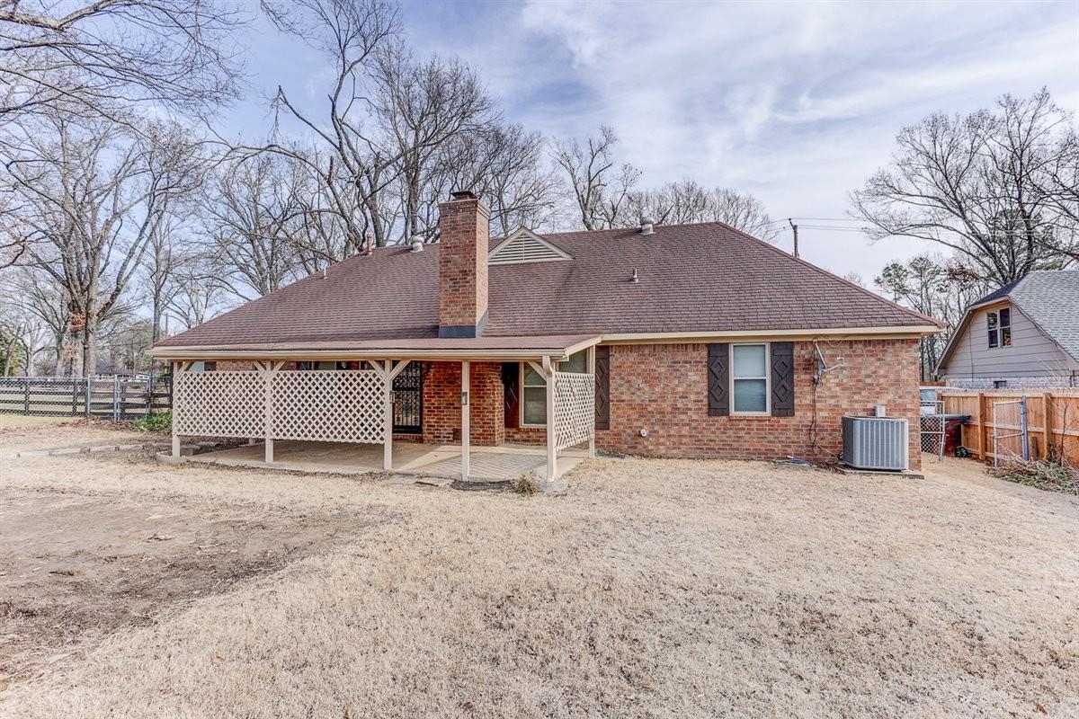 3915 Oak Road Bartlett, TN 38135 - Photo 22 of 28 a front view of a house with a yard and garage