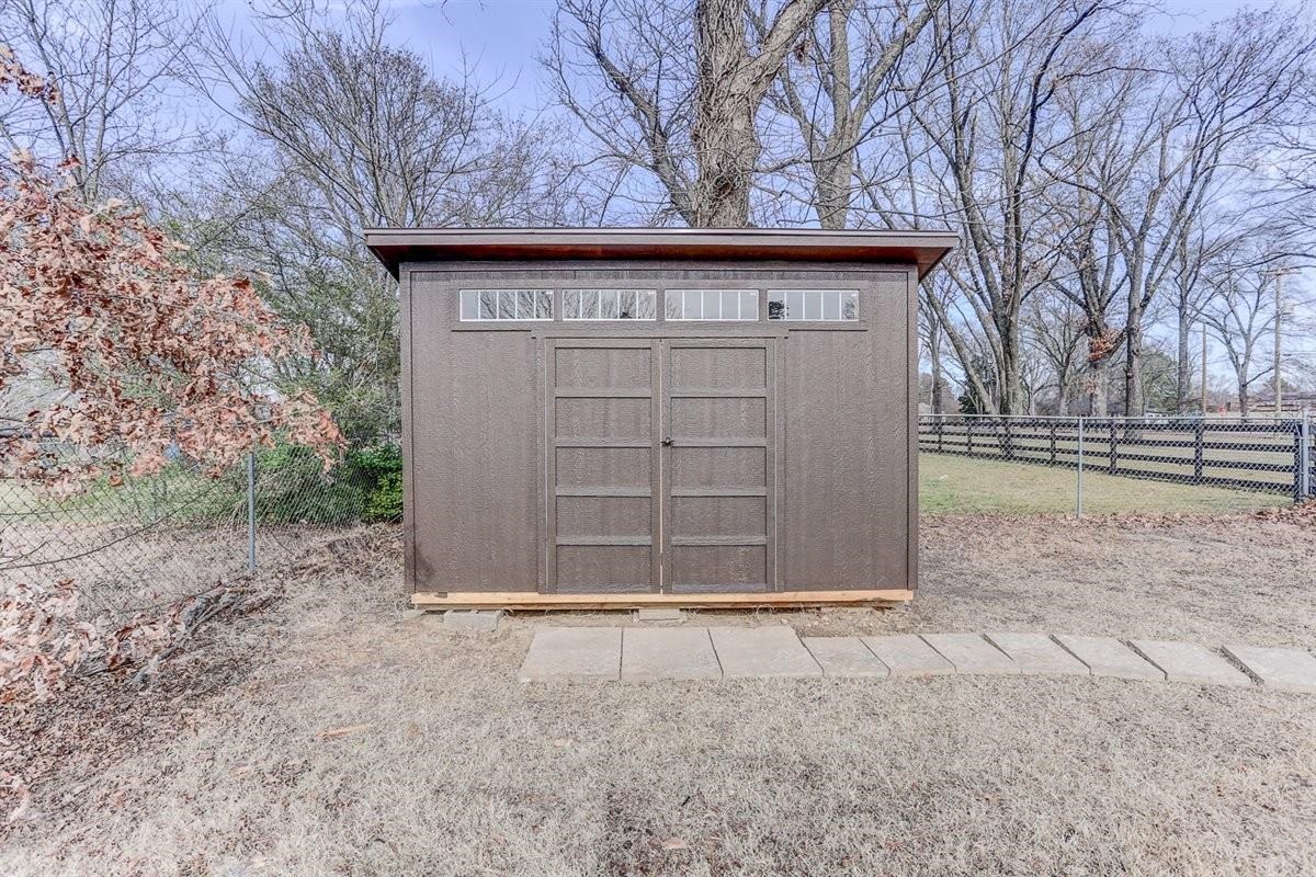 3915 Oak Road Bartlett, TN 38135 - Photo 23 of 28 a front view of a house with a yard