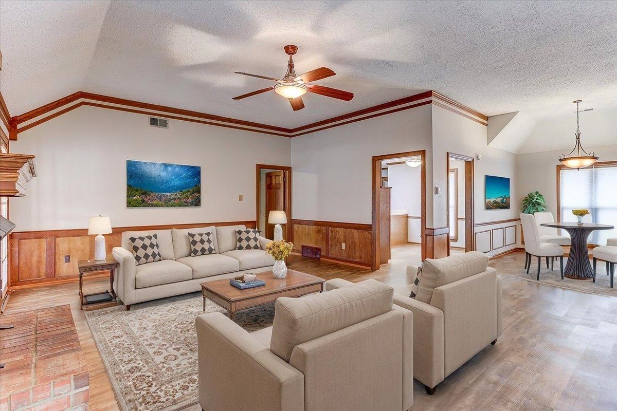 3915 Oak Road Bartlett, TN 38135 - Photo 8 of 28 a living room with furniture and a ceiling fan
