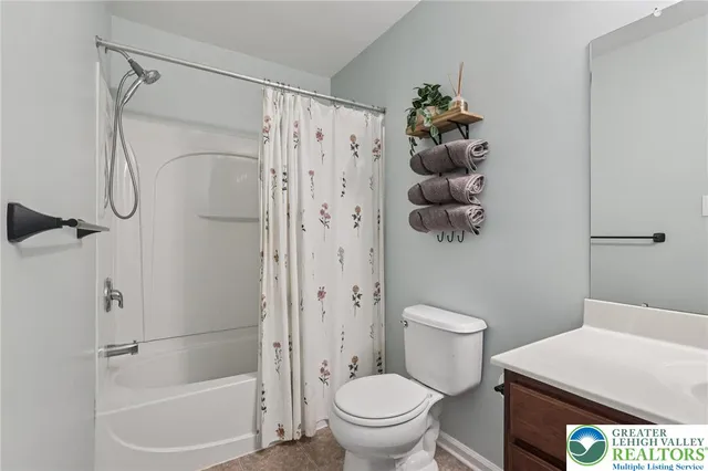 a bedroom with furniture and window