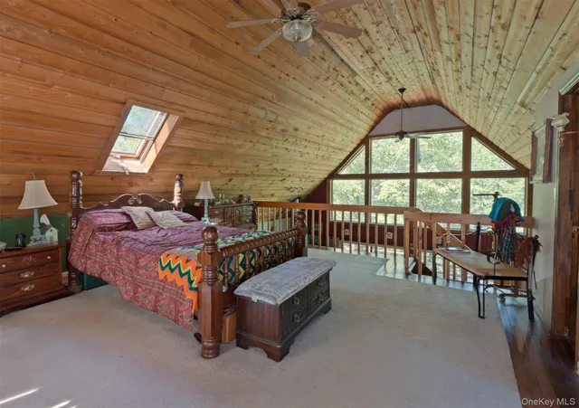 a bathroom with a sink toilet and a mirror