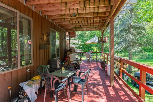 a view of yard with patio