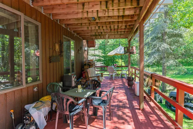 a view of yard with patio