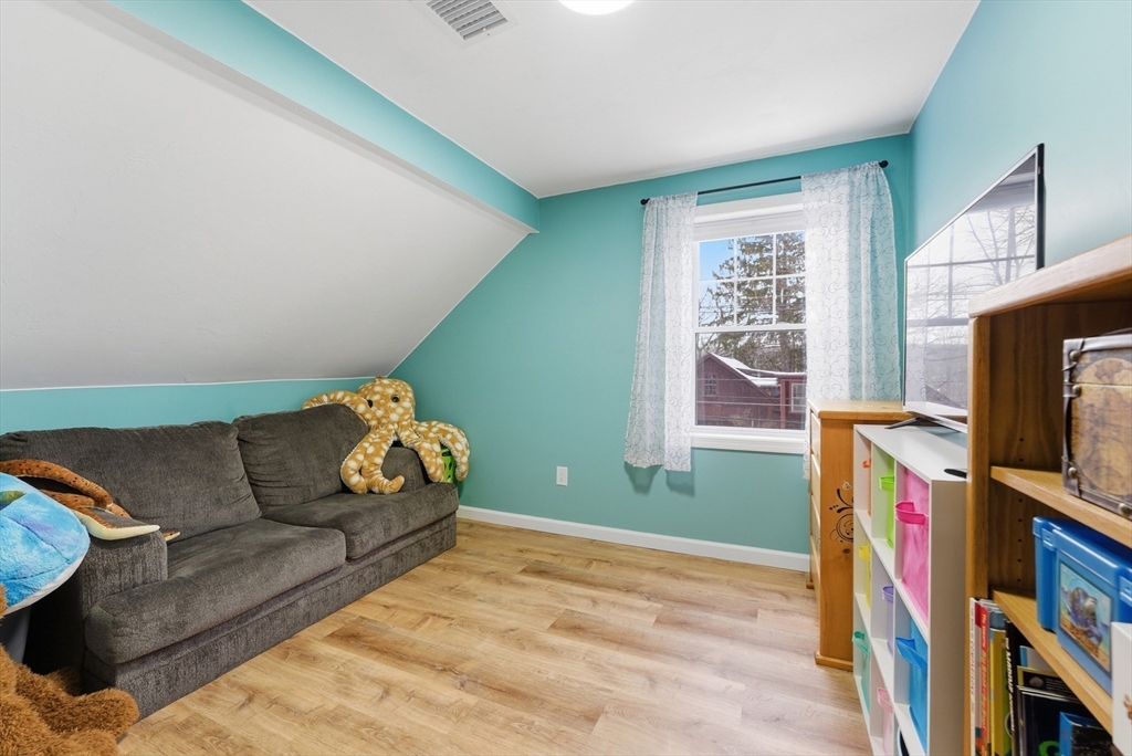160 Cottage Street Athol, MA 01331 - Photo 26 of 35 a living room with furniture and a flat screen tv