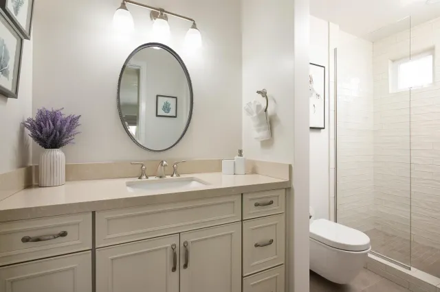 a utility room with sink dryer and washer