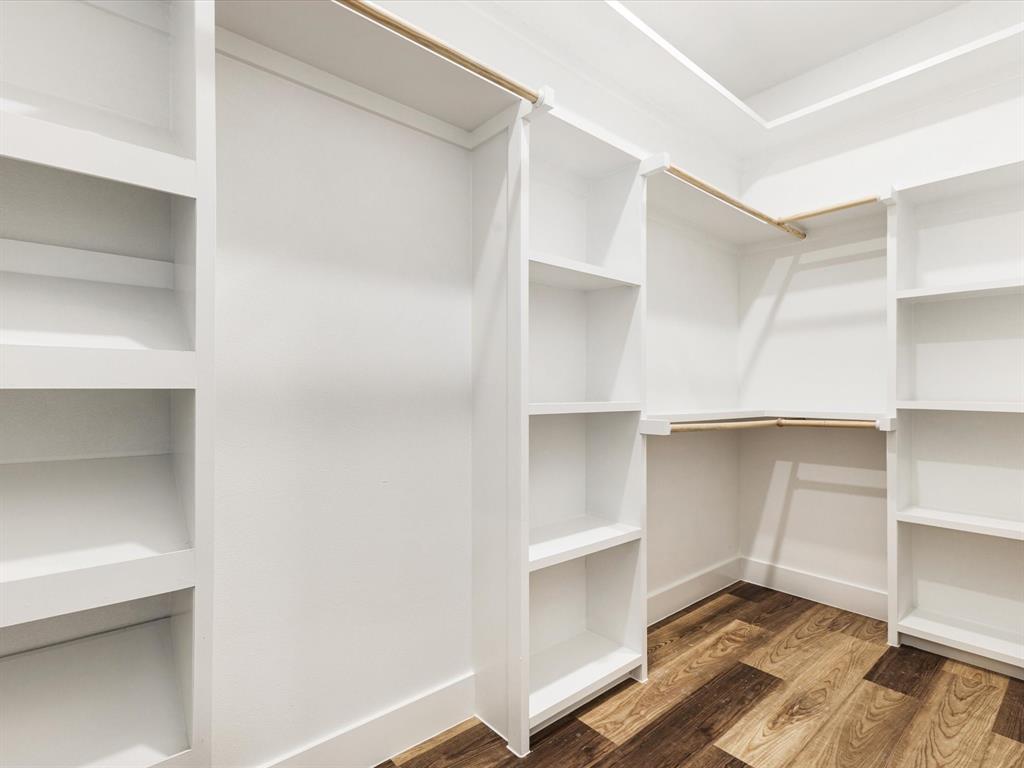 5018 Point La Vista Road Malakoff, TX 75148 - Photo 11 of 32 Walk in closet featuring wood finished floors