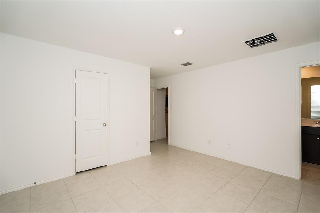 14841 Firerock Road Haslet, TX 76052 - Photo 11 of 18 a view of an empty room