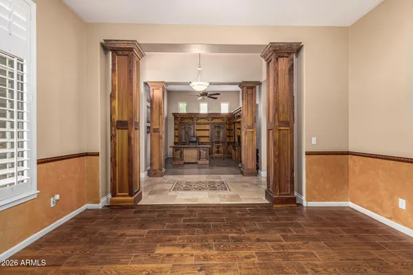 a large bathroom with a glass door shower and sink