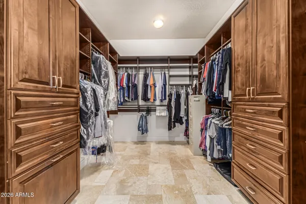 a view of a bathroom with tub and shower