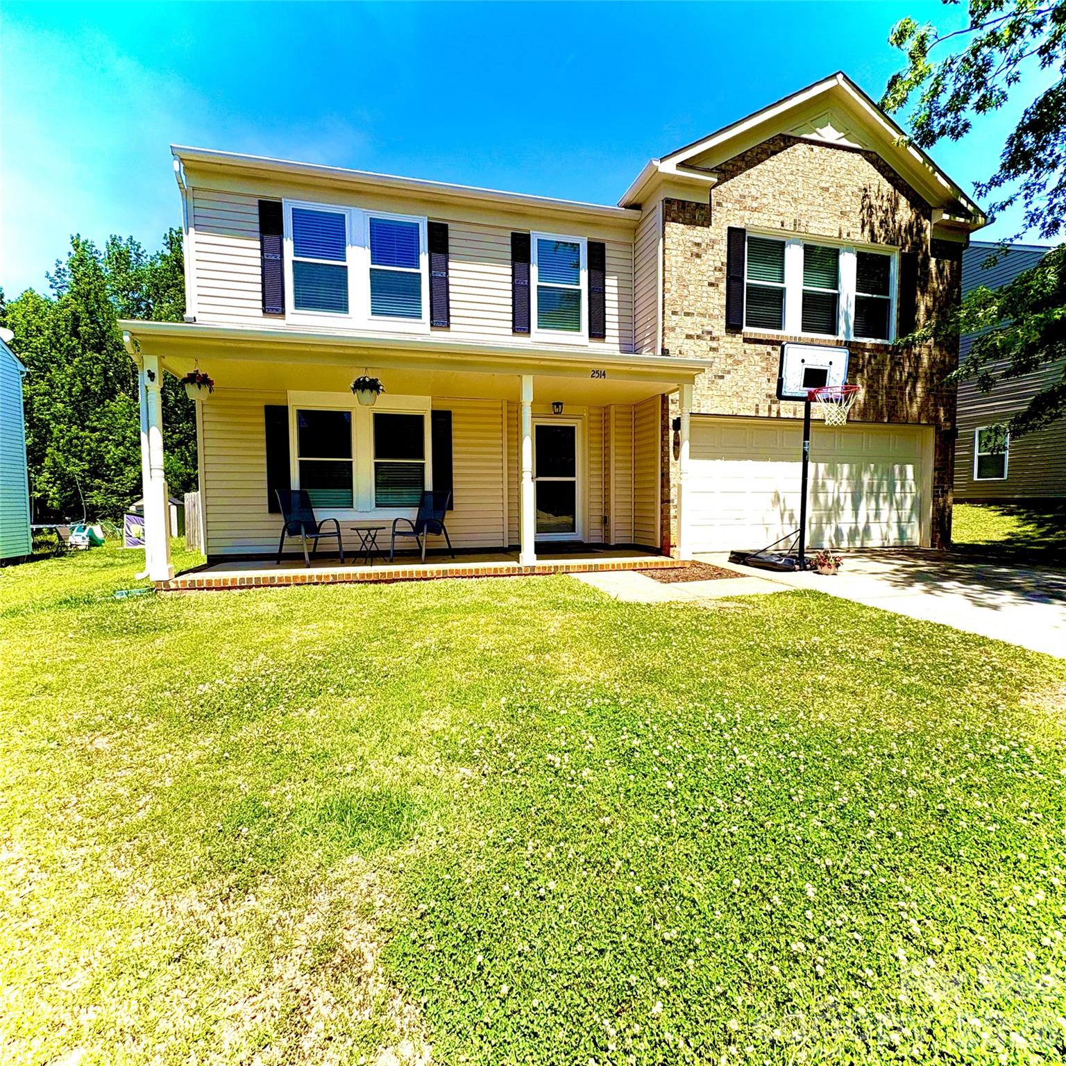2514 Spring Breeze Way Monroe, NC 28110 - Photo 25 of 25 a front view of a house with a yard