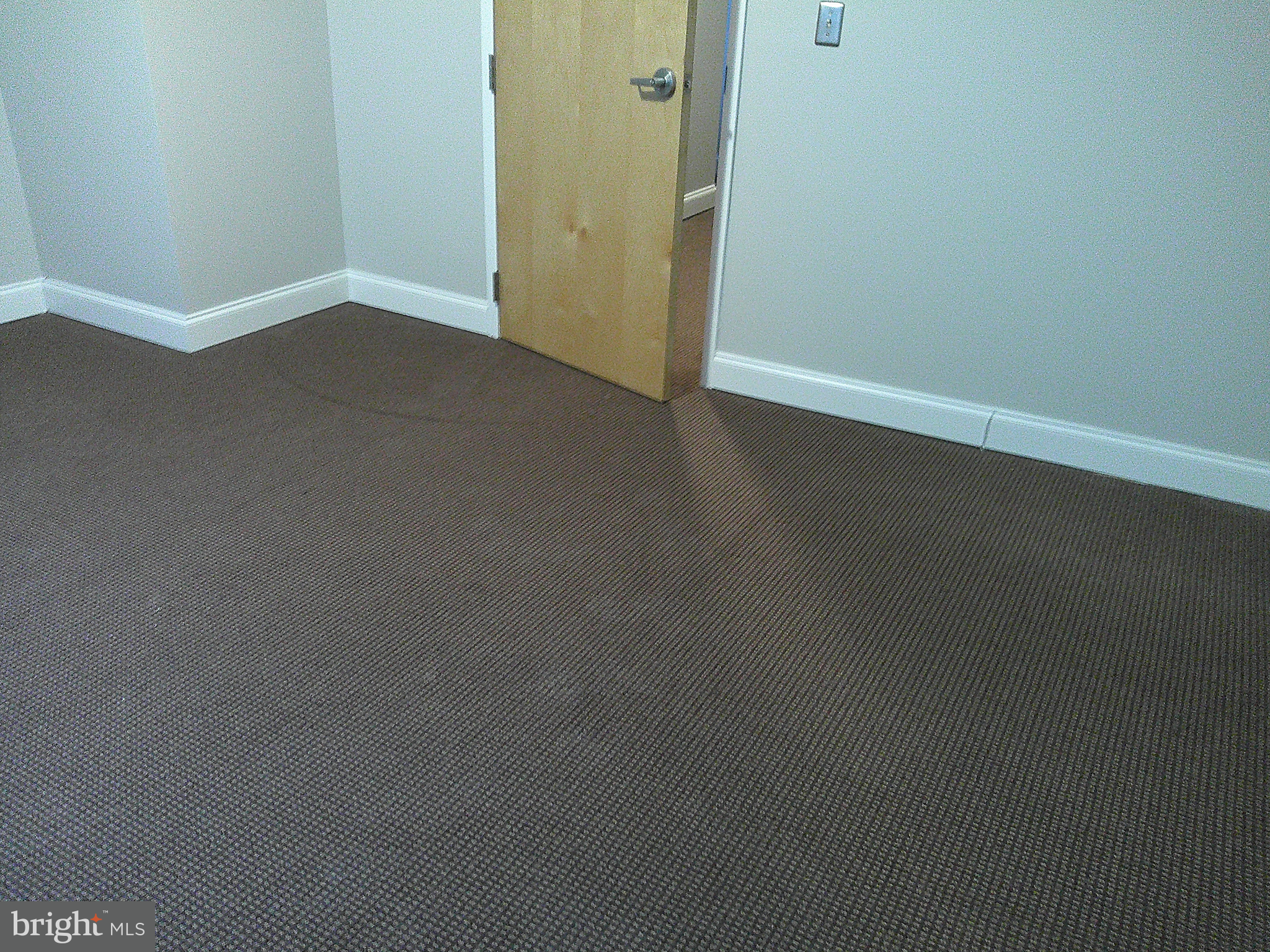 6 East 13th Street, Unit 3 Wilmington, DE 19801 - Photo 5 of 9 a view of an empty room