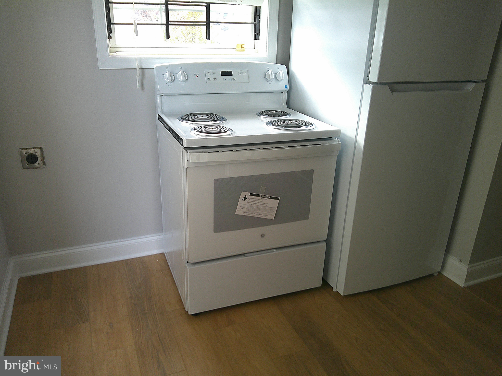 6 East 13th Street, Unit 3 Wilmington, DE 19801 - Photo 6 of 9 a utility room with dryer and washer