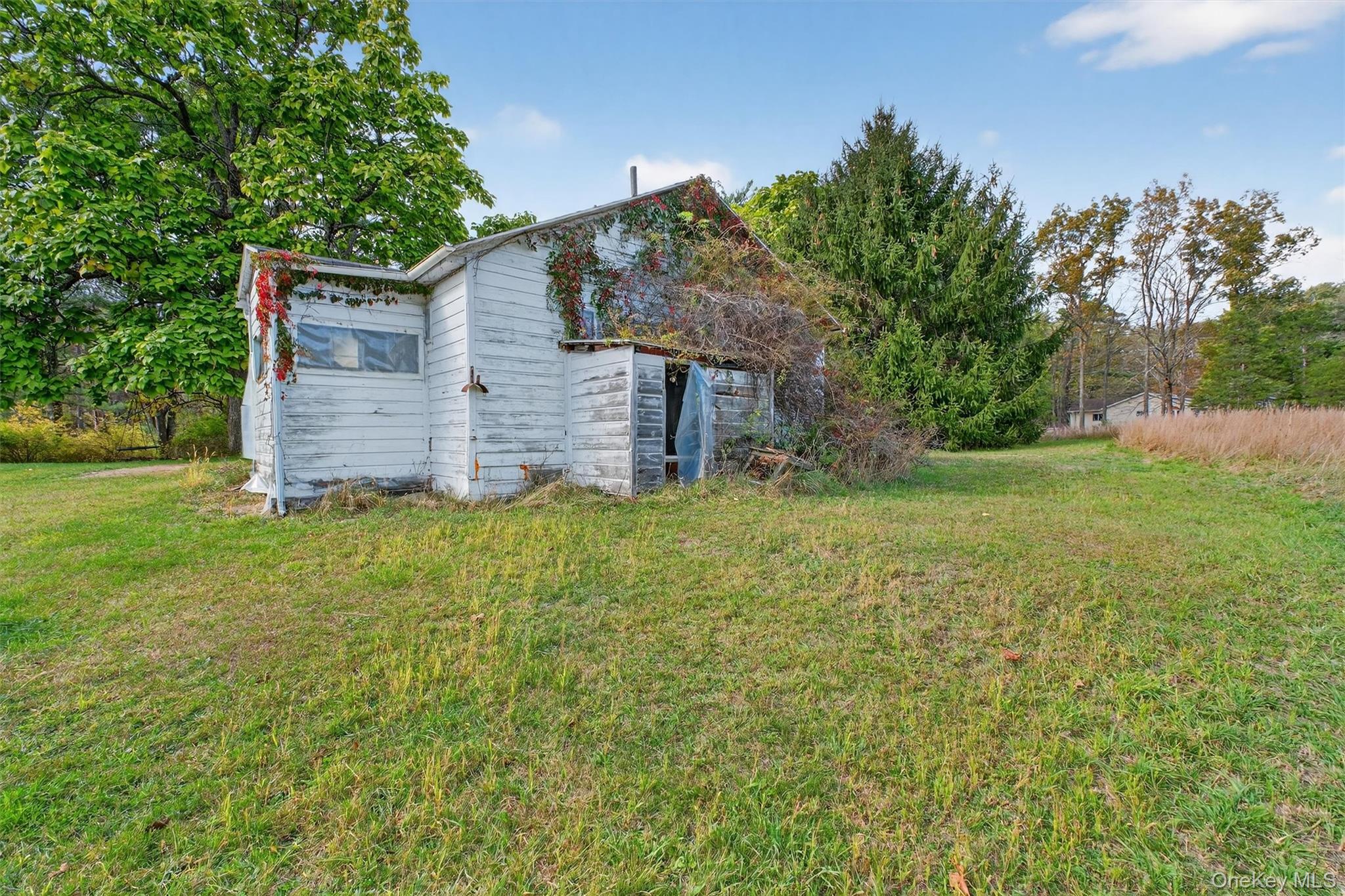 300 Band Camp Road Saugerties, NY 12477 - Photo 22 of 48 a view of a house with a yard