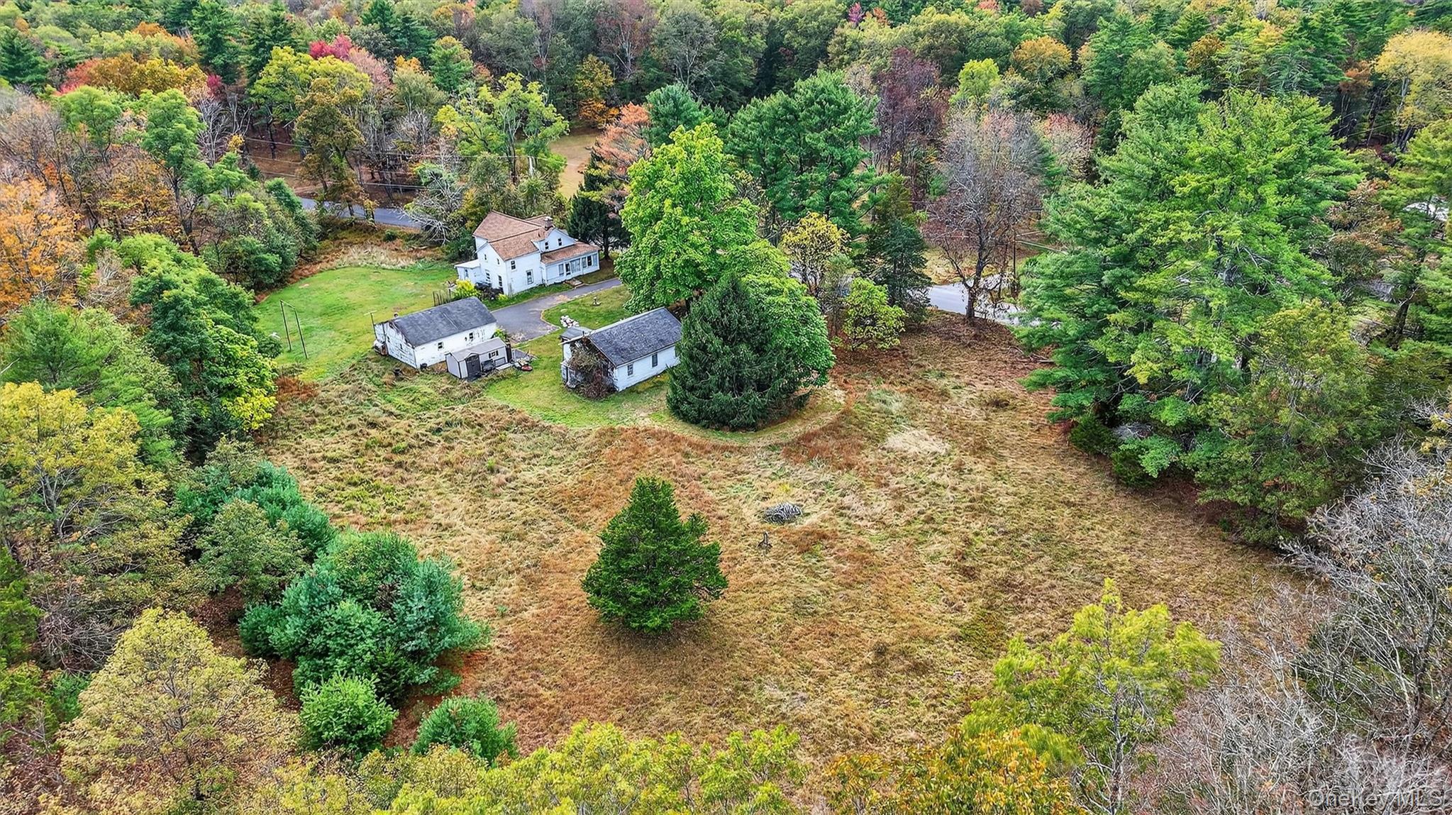 300 Band Camp Road Saugerties, NY 12477 - Photo 26 of 48 a backyard of a house with a yard with outdoor seating