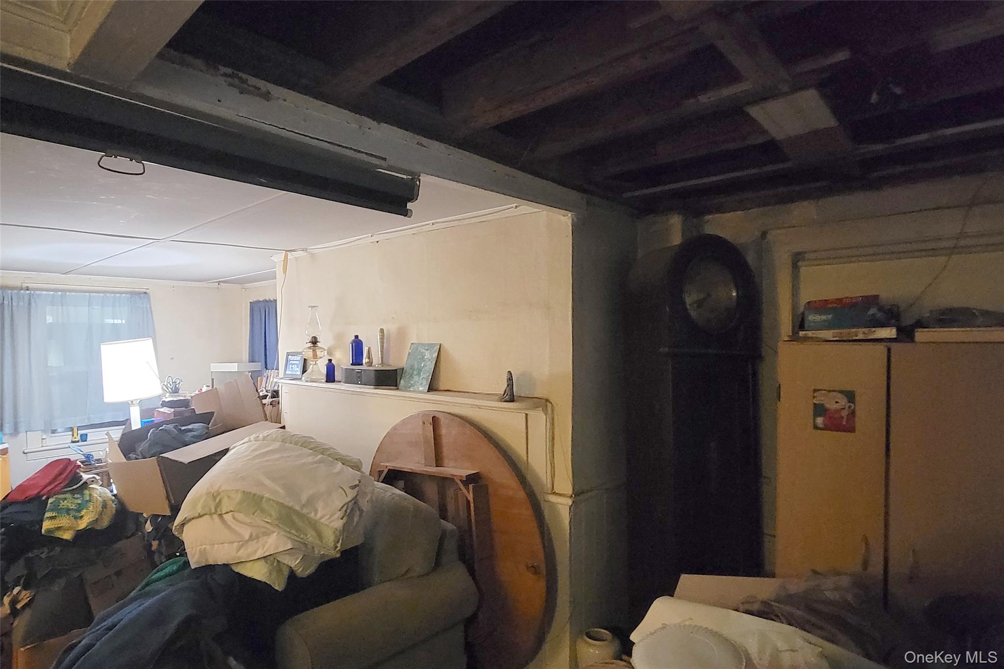 300 Band Camp Road Saugerties, NY 12477 - Photo 33 of 48 a bed room with a bed and a mirror