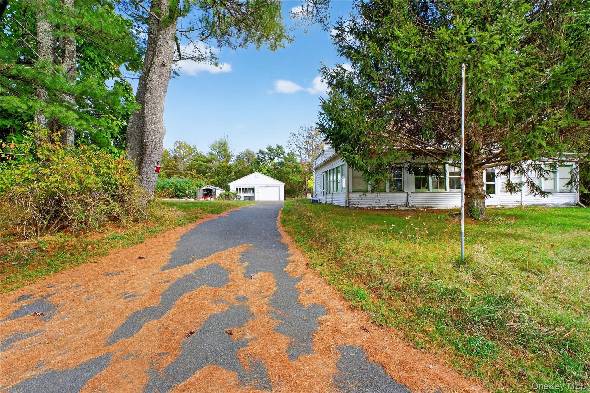 300 Band Camp Road Saugerties, NY 12477 - Photo 44 of 48 a view of a house with swimming pool and sitting area