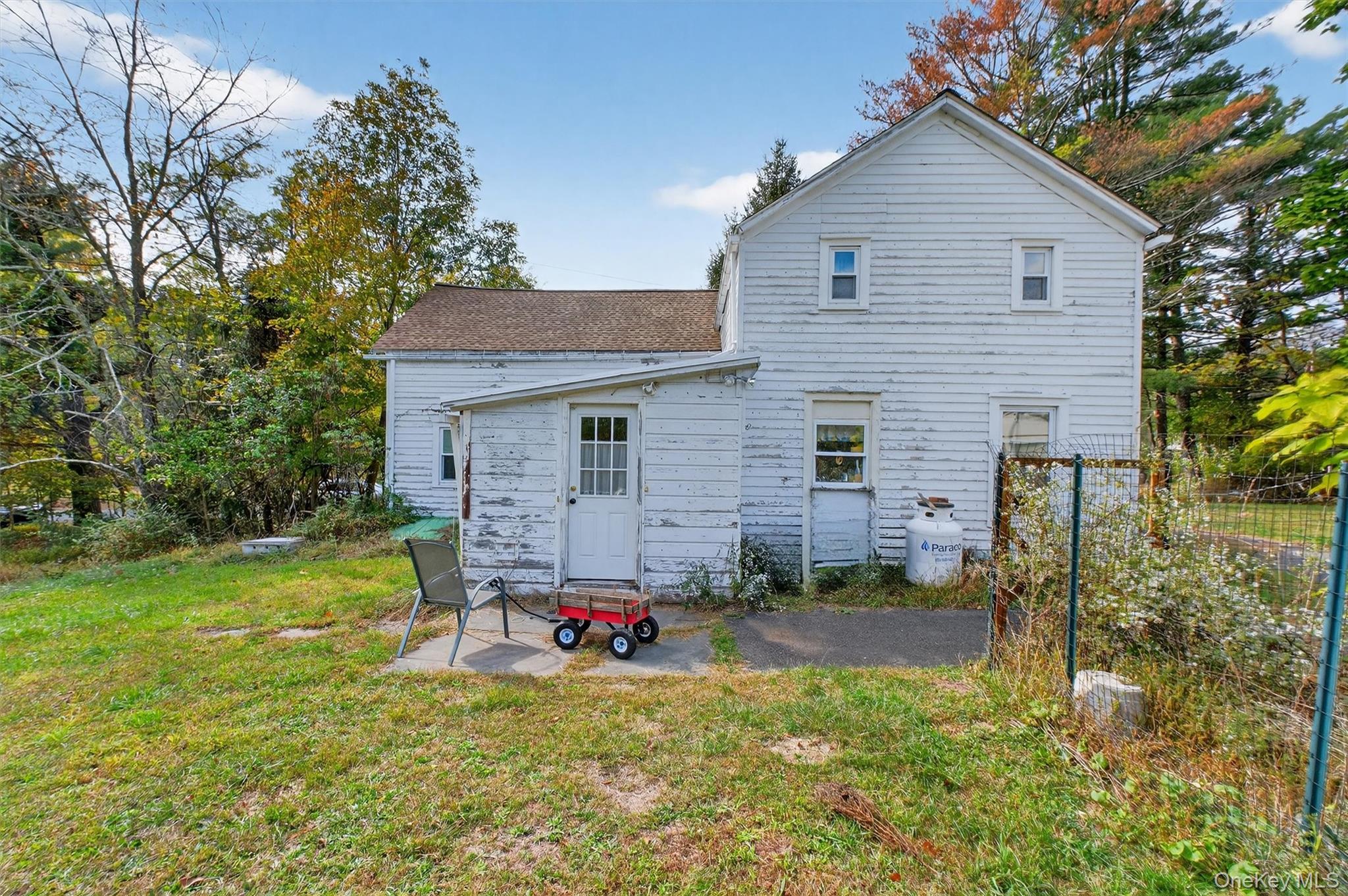 300 Band Camp Road Saugerties, NY 12477 - Photo 10 of 48 a view of a house with backyard and chairs