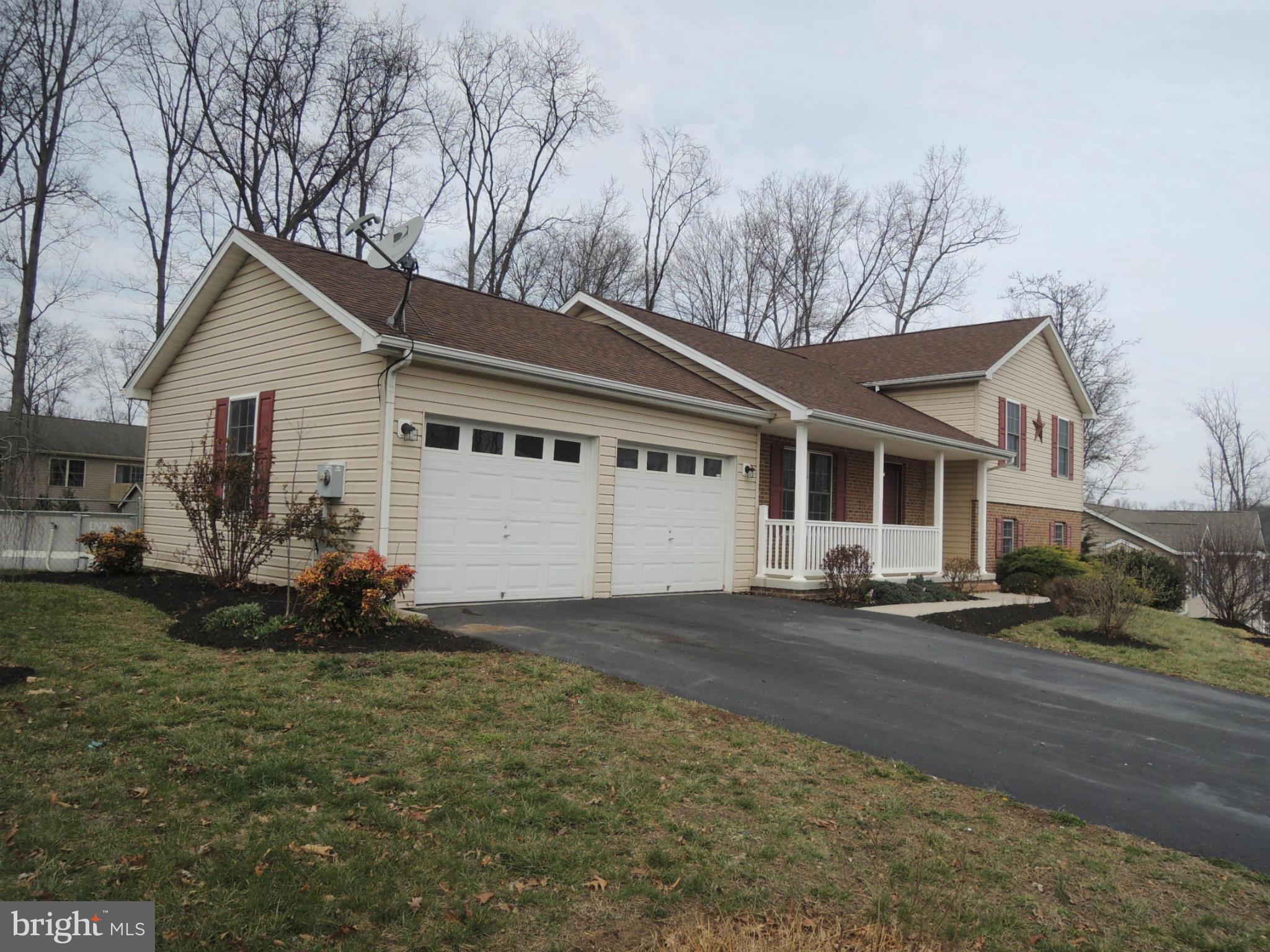 39 Raft Court Inwood, WV 25428 - Photo 2 of 30 a view of a house with a patio