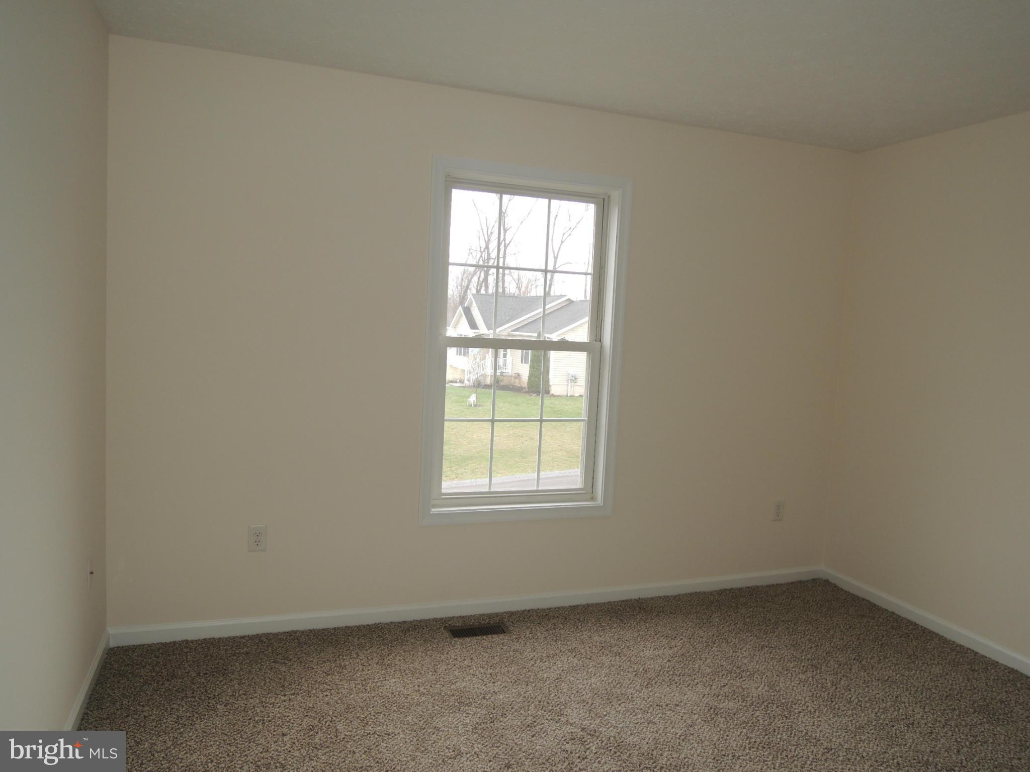 39 Raft Court Inwood, WV 25428 - Photo 18 of 30 an empty room with a window