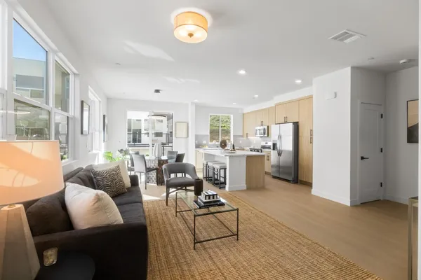 a living room with furniture and a table