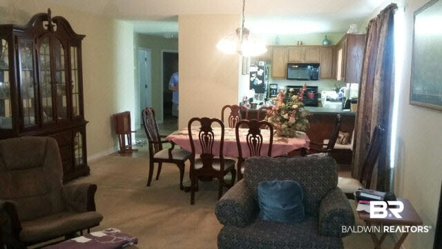 8877 Fall Court Mobile, AL 36695 - Photo 9 of 27 The huge great room is located in the back of the home for added privacy.