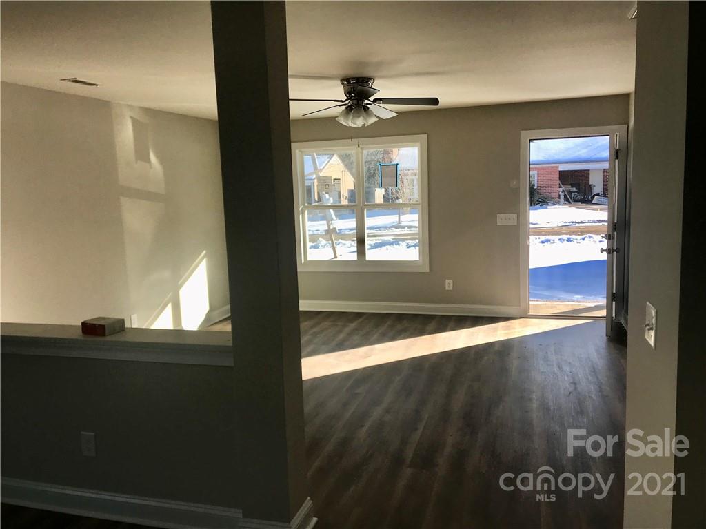 1007 3rd Street Spencer, NC 28159 - Photo 7 of 12 a view of an empty room and window