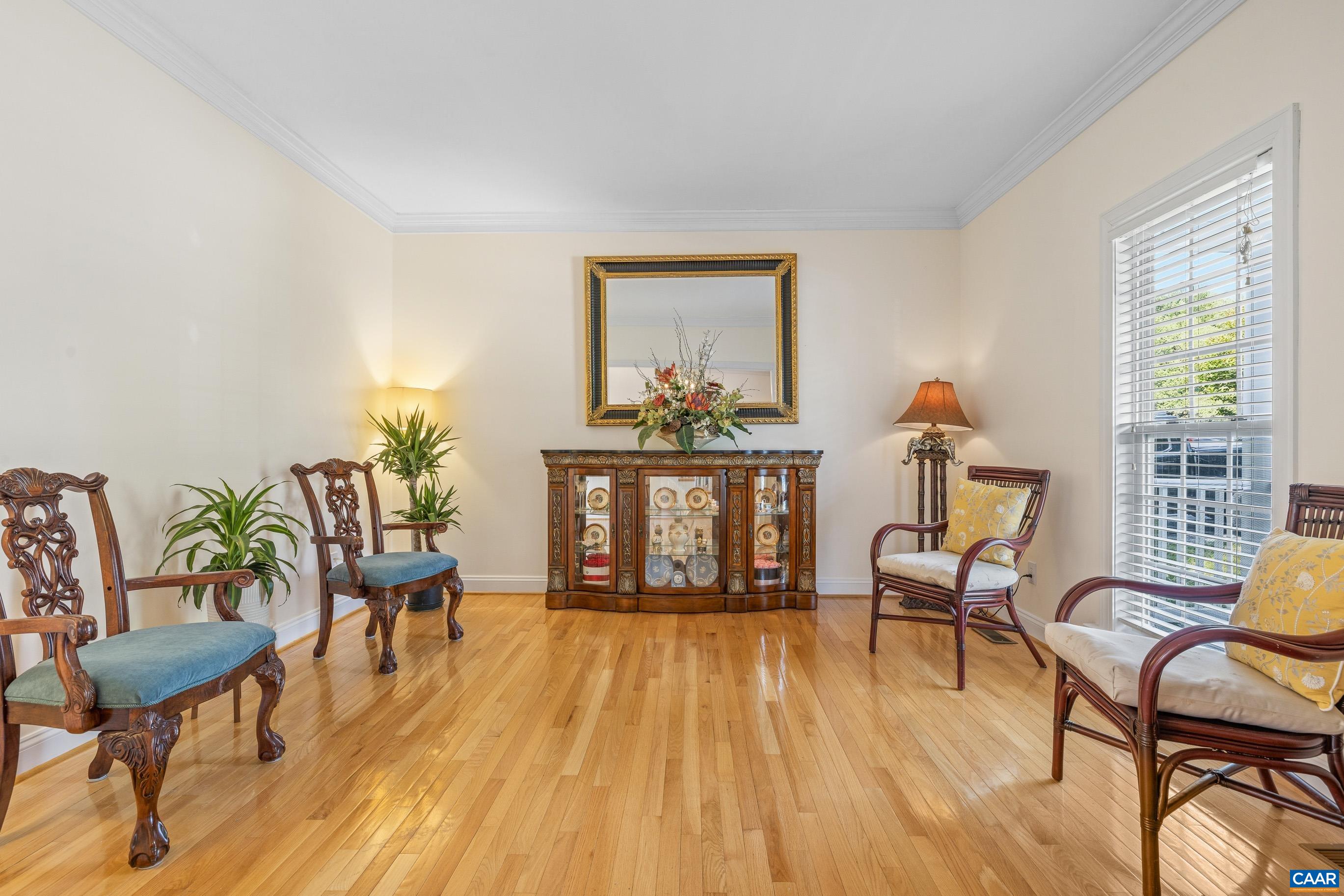 1236 Amber Ridge Road Charlottesville, VA 22901 - Photo 11 of 56 a living room with furniture a fireplace and a large window