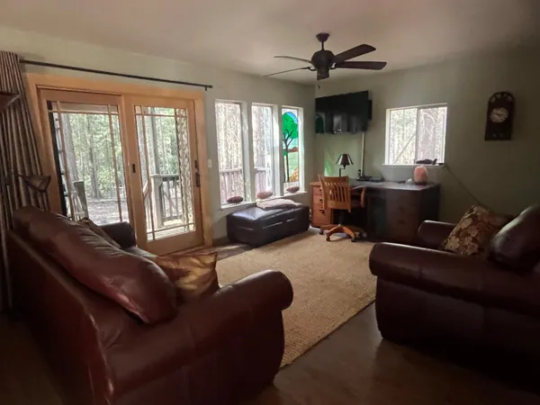 a kitchen with granite countertop cabinets stainless steel appliances and a sink