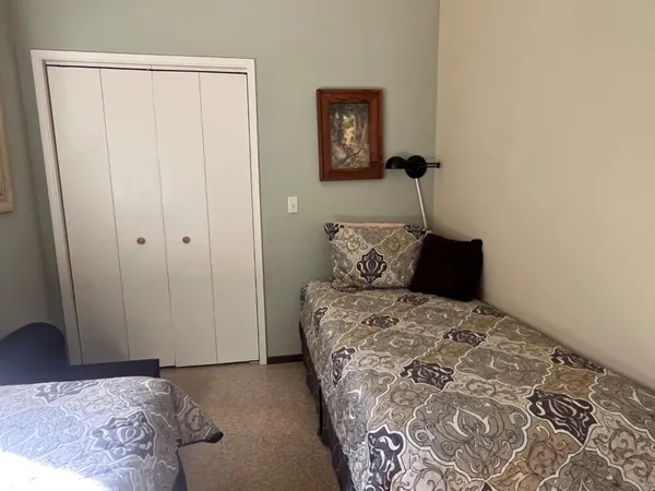 a kitchen with stainless steel appliances a stove sink and microwave