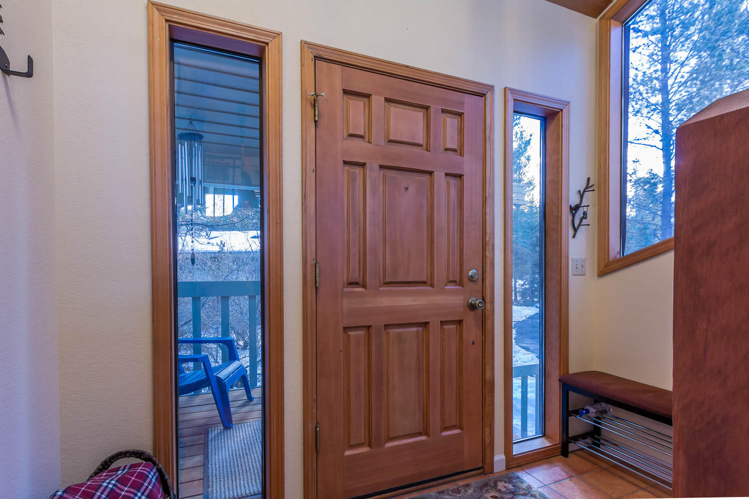 17704 Rogue Lane Sunriver, OR 97707 - Photo 5 of 26 a view of front door with wooden door