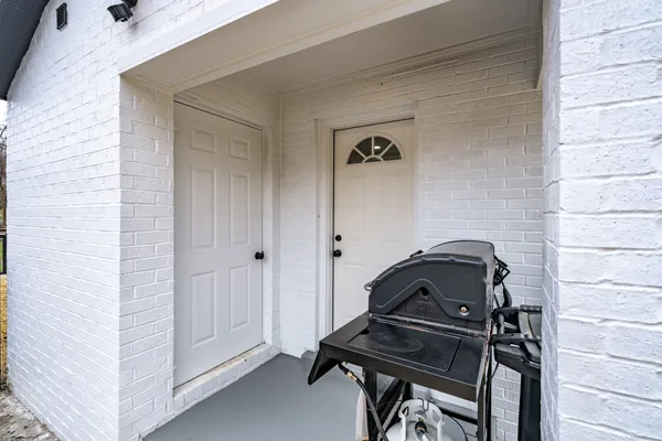 a view of a closet with storage