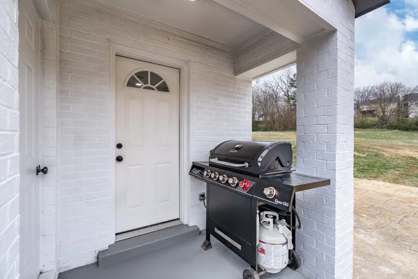 a view of workspace with wooden floor windows