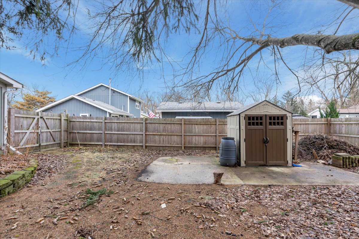 5220 Palm Street Barrington, IL 60010 - Photo 18 of 22 a view of a wooden house with a yard