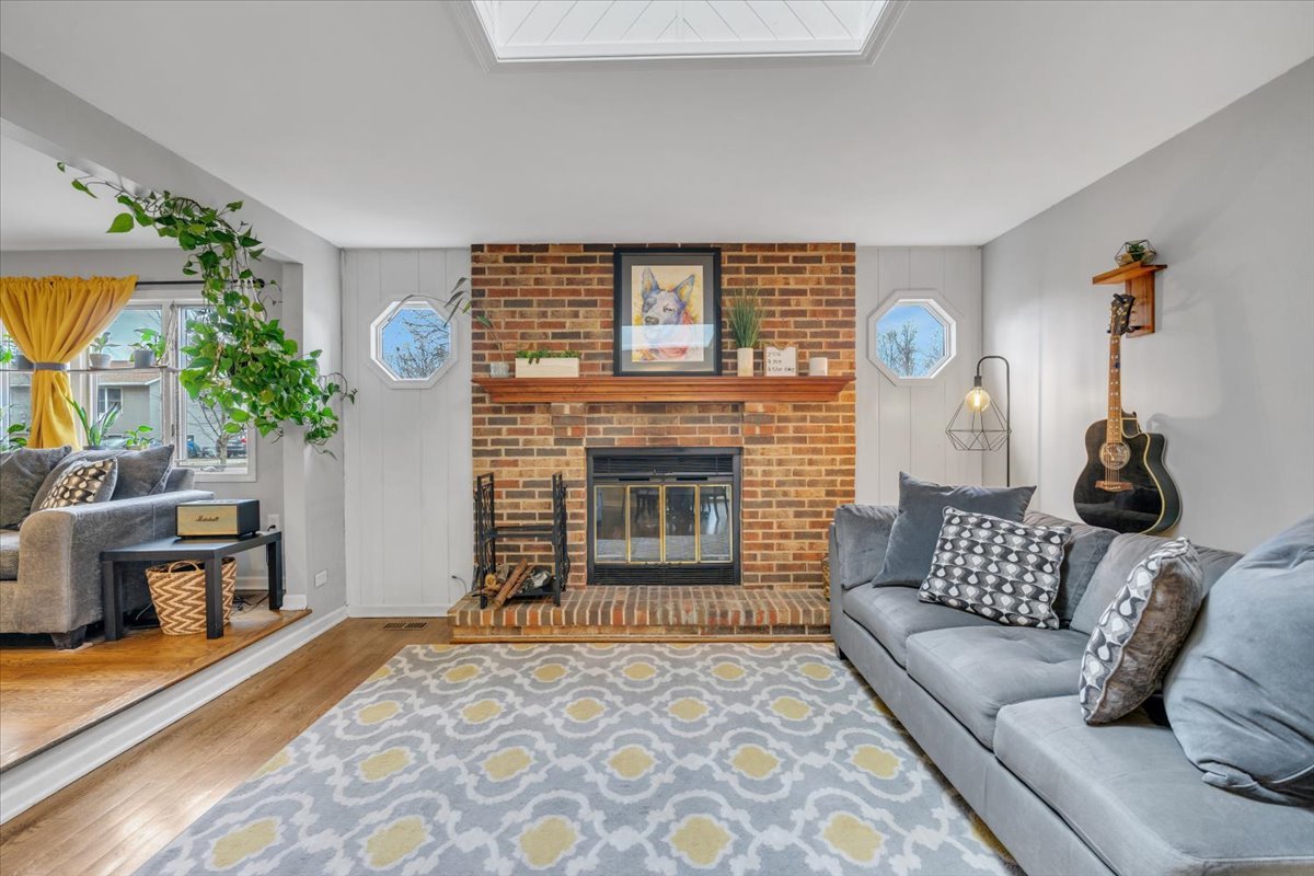 5220 Palm Street Barrington, IL 60010 - Photo 5 of 22 a living room with furniture and a fireplace