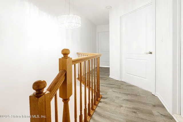 a view of entryway with wooden floor