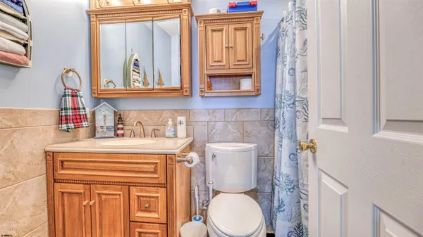 a bedroom with a bed and a table