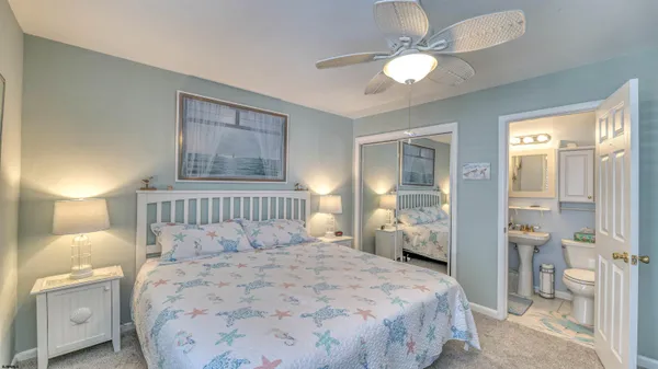 a view of a balcony with wooden floor and outdoor seating