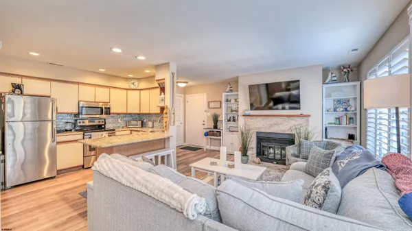 a living room with furniture and a table