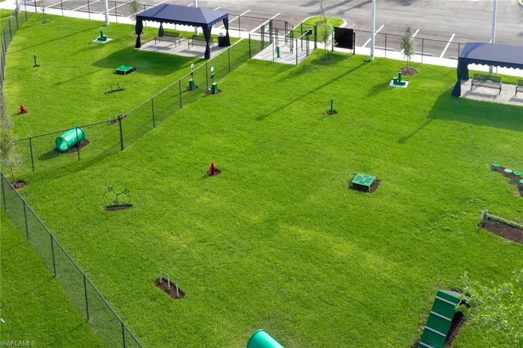 12100 Eucalyptus Way Naples, FL 34120 - Photo 31 of 36 a view of a golf course with chairs