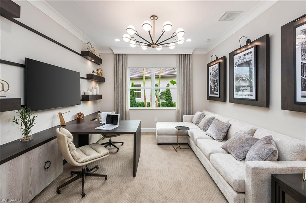 12100 Eucalyptus Way Naples, FL 34120 - Photo 9 of 36 a living room with furniture and a flat screen tv